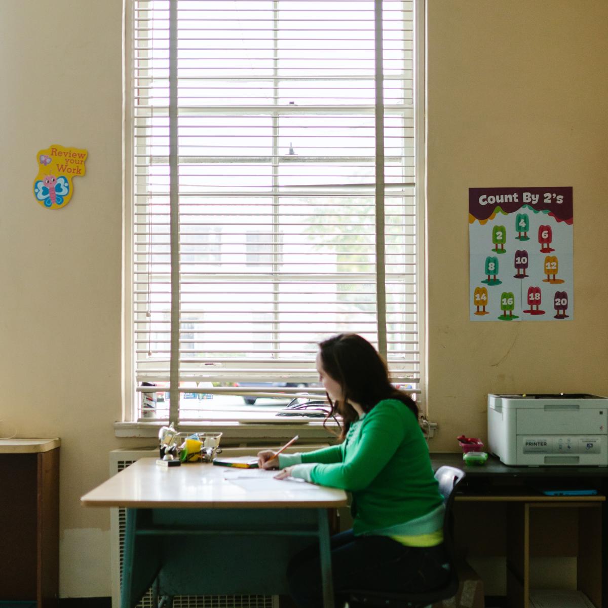 Teacher at Desk